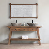 Reclaimed teak wood bathroom vanity with two sinks and a mirror in a minimalistic setting.