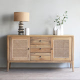 Wooden sideboard with rattan doors in a room setting
