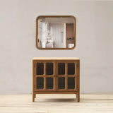 Wooden cabinet with a mirror above it in a minimalistic room.