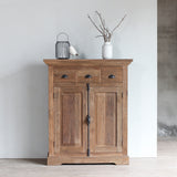 Front view of LYON Cabinet with decoration items on top of it.