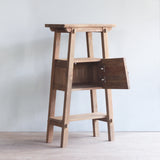 Perspective view of Vanity Small Cabinet with opened door.