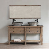 Reclaimed pine wood mirror above a bathroom cabinet.