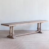 Reclaimed pine wood bench with turned leg.