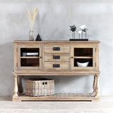 Monarch Sideboard with decoration item on top, books and bowl inside, and wicker basket on the under-shelf.