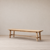 Outdoor wooden bench on a wooden floor against a plain wall