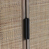 Close-up of a rattan doors with a black hinge in the center.