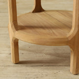 Wooden side table on a wooden floor