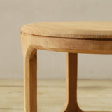 Wooden end table with a plain background