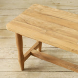 Wooden bench on a wooden floor