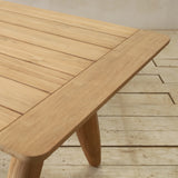 Wooden outdoor table on a wooden deck