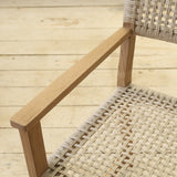 Rattan woven chair on a wooden floor