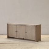Reclaimed pine wood sideboard with three doors on a wooden floor against a plain wall.