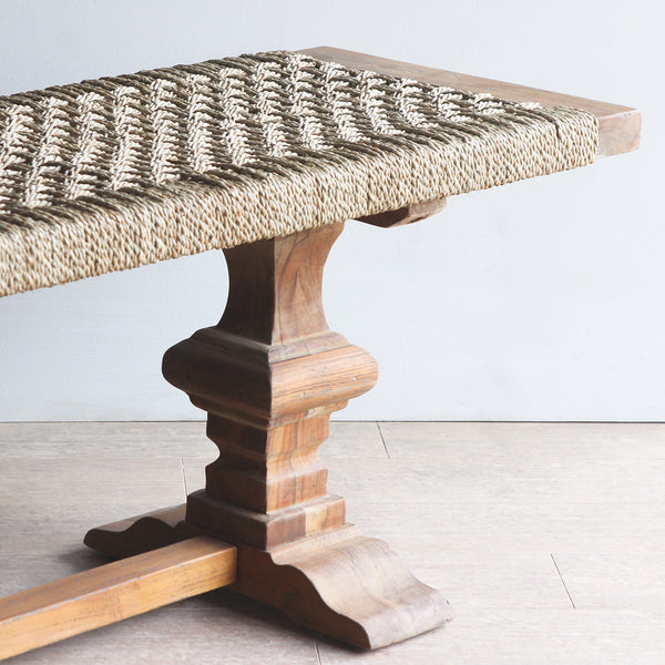 Detail view of LYON Bench with woven seagrass as seat.