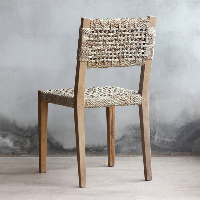 Back view of LYON Chair. Made from reclaimed teak wood frame combined with woven sisal backrest and seat.