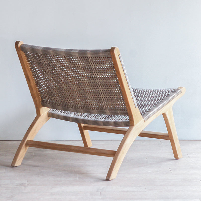 Back view of Lovina Lounge Chair. Made from reclaimed teak frame and synthetic rattan weaving.