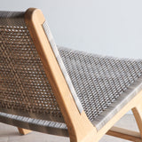 Detail view of Lovina Chair. Showing the texture of synthetic rattan weaving.