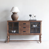 Front view of Rome Sideboard with table lamp and decorative item on top of it.