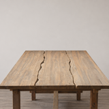 Outdoor wooden dining table with live edge planks on top