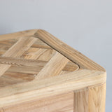 Wooden surface with a geometric pattern on a gray background