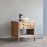 Wooden bathroom vanity with a sink against a plain wall.