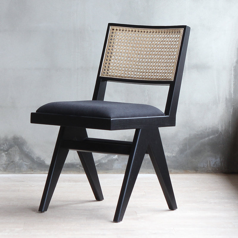 3/4 view of Torino Rattan Chair in black wood frame and black fabric.