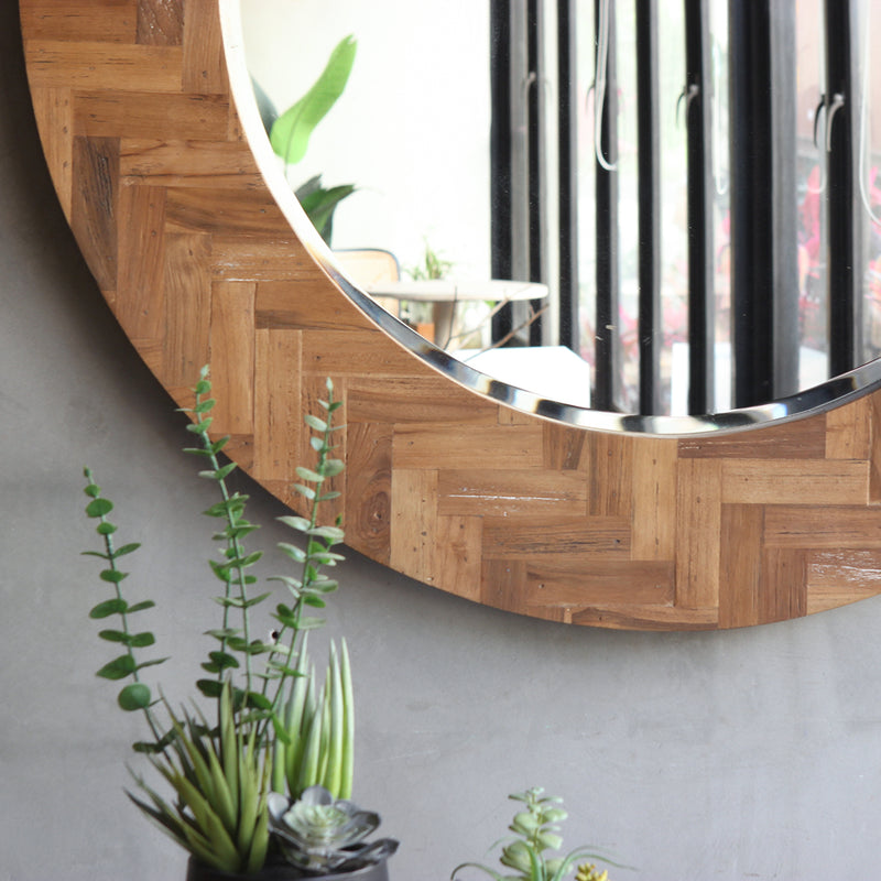 Detail view of Mozaic Round Mirror's upcycled wood pattern.