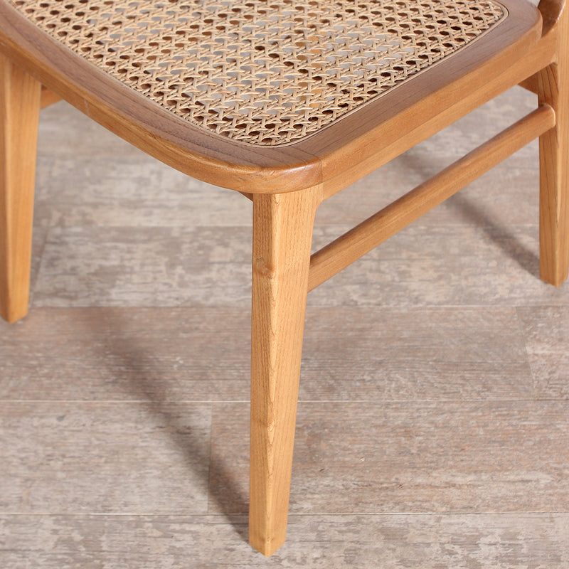 Detail of Monaco Dining Chair's seat and leg.